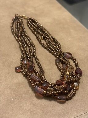 Multi-Strand Brown Beaded Necklace with Amber Accents